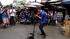 Violinist Stuns Bangkok Street with Radioactive Looping Cover